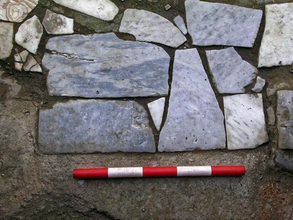 V.17/18, Herculaneum. May 2004. Detail of doorway. Photo courtesy of Nicolas Monteix.